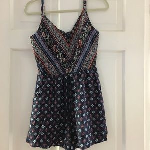 Festive and fun patterned romper!